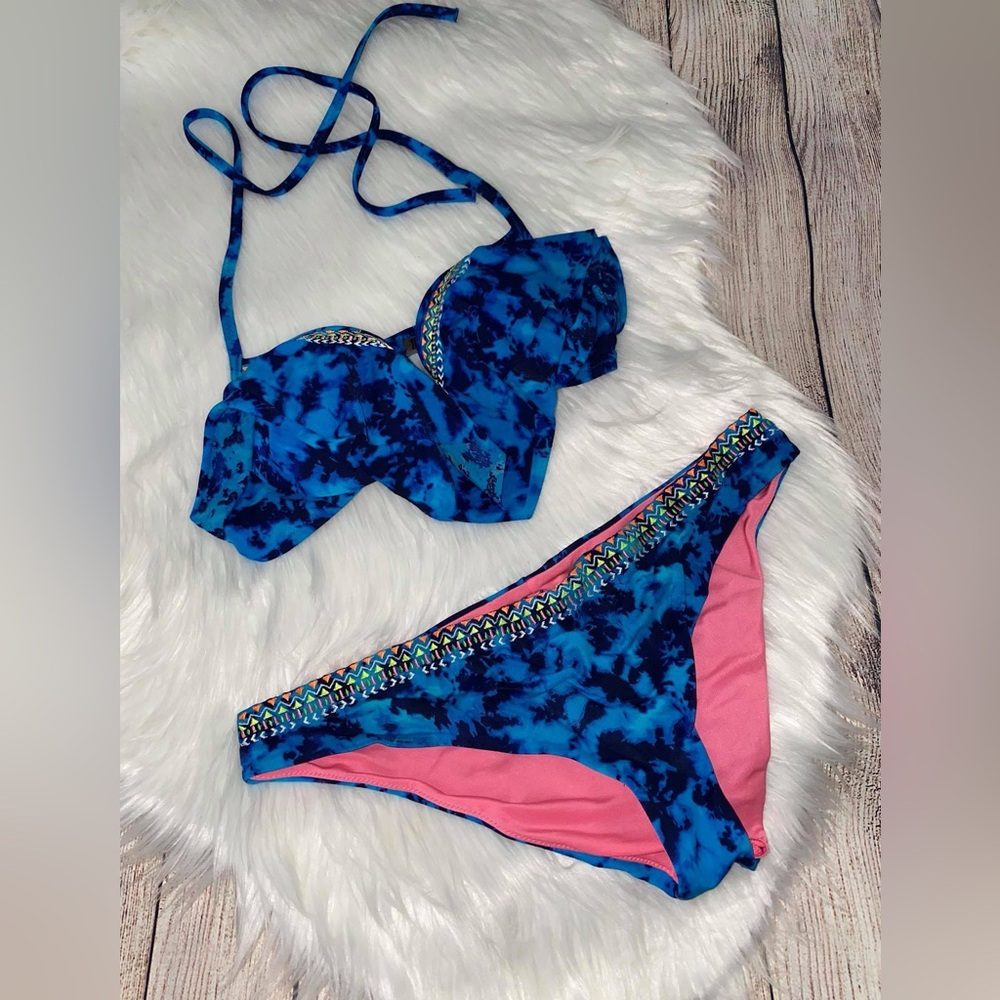 Pink bikini top size small bottoms size m 
Blue and Pink Bikini Set